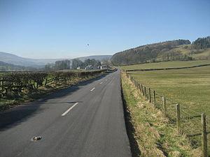 English: Road heading towards Boarsden Portion...