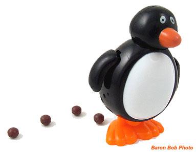 Penguin Pooper Dispenses Chocolate Poop You Can't Refuse