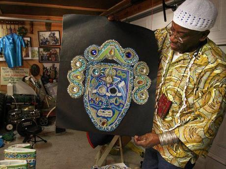 John McCusker / The Times-Picayune Big Chief Victor Harris shows off a beadwork mask underway in his garage.