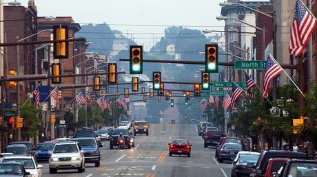 Traffic moves along the main street as signals change in Butler, Pa.  (AP File Photo/Keith Srakocic)