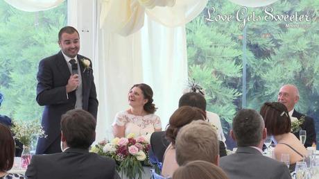 groom delivering funny speech in marquee at Soughton Hall