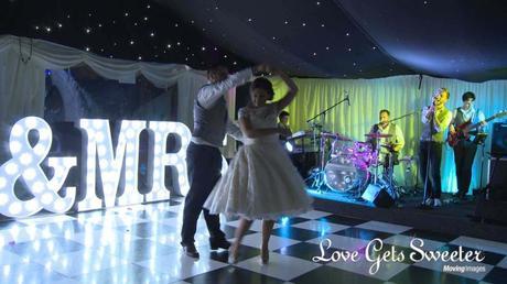 first dance at Soughton Hall in front of Mr and Mrs light up letters