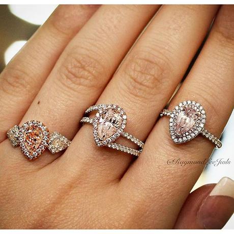 Pear shaped halo engagement rings