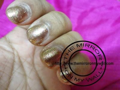 CoverGirl OutLast Stat Brilliant GlossTinis in Seared Bronze 63010.JPG