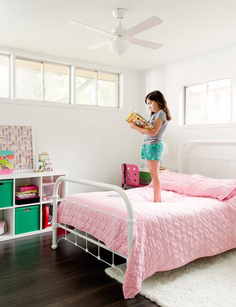 Pops of color make a bedroom perfect for the couple's young daughter.