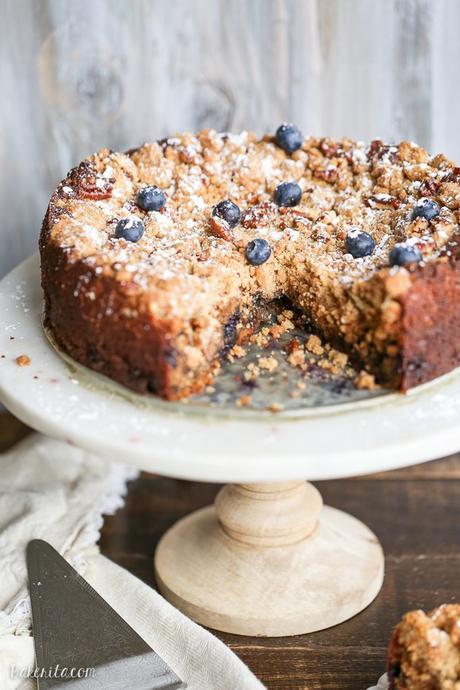 This Blueberry Crumb Cake has a thick layer of pecan crumble atop a flavorful cake that is bursting with fresh blueberries! This cake is perfect dusted with powdered sugar or served with a bit of whipped cream.