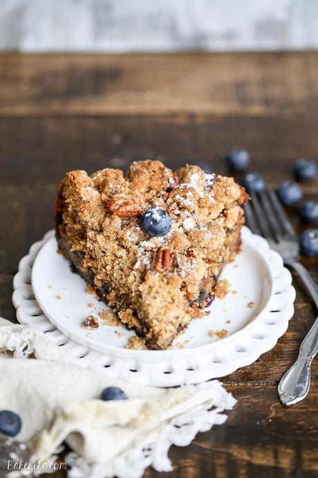 This Blueberry Crumb Cake has a thick layer of pecan crumble atop a flavorful cake that is bursting with fresh blueberries! This cake is perfect dusted with powdered sugar or served with a bit of whipped cream.