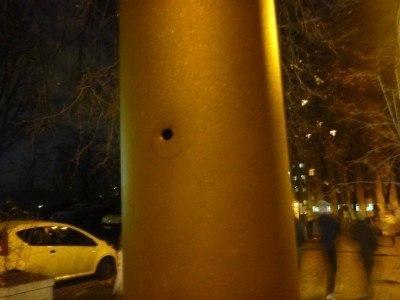 Backpacking in Ukraine: Getting A Free Night Tour of Kiev A blatant bullet hole in a lampost