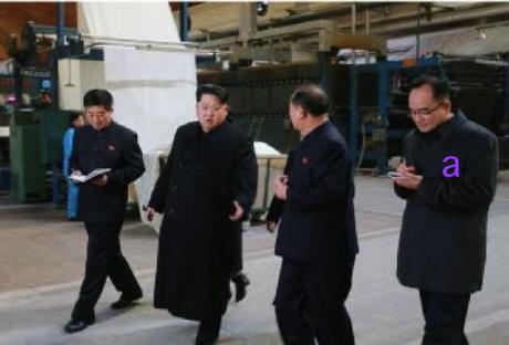 Kim Jong Un tours the Kim Cho'ng-suk Textile Mill in Pyongyang.  Also in attendance is WPK Organization Guidance Department deputy director Jo Yong Won (Photo: Rodong Sinmun).