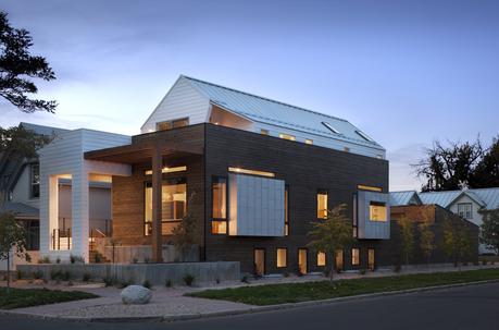 Denver home with setback top floor to create roof deck space. 