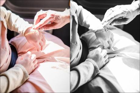 Bride looks at flower girls special bracelet