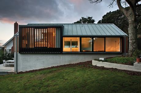New Zealand home with anodized aluminum louvers by the master bedroom