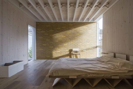 London bedroom with exposed beams. 