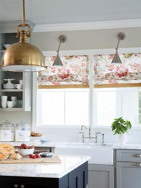 Brass Pendant Light And Chrome Sconces In the Kitchen