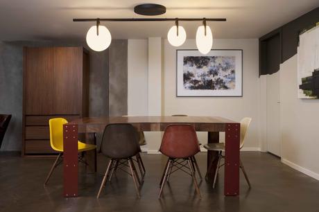 San Francisco dining room with chandelier and Eames shell chairs