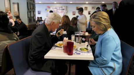 U.S. Democratic presidential candidate Hillary Clinton and her husband, former U.S. President Bill Clinton eat breakfast at the Chez Vachon restaurant in Manchester