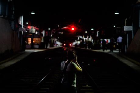 Charlene at Colombo Fort station. The fact that you can just stand on the tracks still boggles my mind!