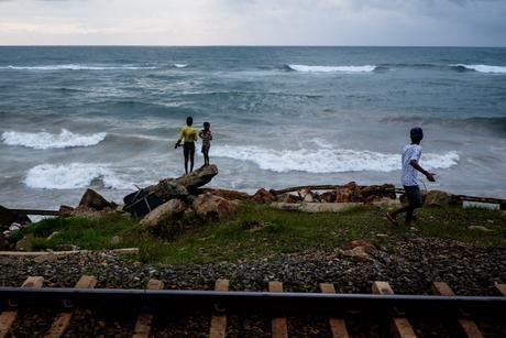 All up and down the tracks kids are playing, people hang out, fish, swim, and just use the tracks as a walking path.