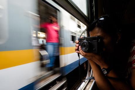 Charlene making some wicked pictures with the Fujifilm X-Pro2 while another train blasts right by us.