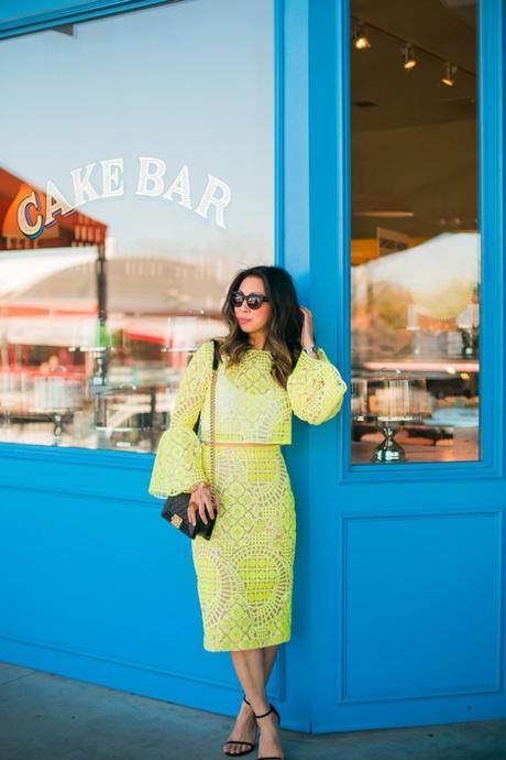 alexis yellow lace aurora crop top, stuart weitzman nudist heel, chanel boy bag, quay kitty sunglasses