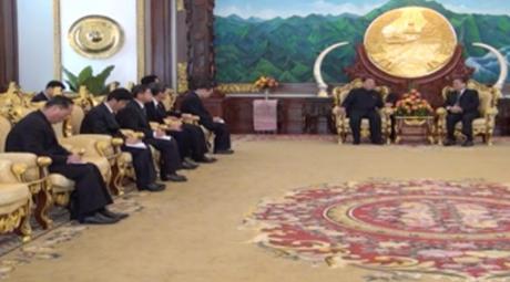 WPK Secretary Kim Yong Chol (background, left) meets with Lao President Choummaly Sayasone (background, right) in Vientiane on February 12, 2016 (Photo: KPL video screen grab).