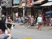 DAILY PHOTO: Saigon Street Scene with Yellow Daisies