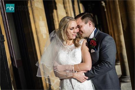 bride and groom cuddling 