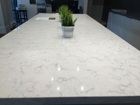 The current dark, Formica countertops will be replaced with LG Minuet Quartz that looks a lot like marble. After pinning picture upon picture of white countertops with white cabinets, I think it's safe to assume that this is the 