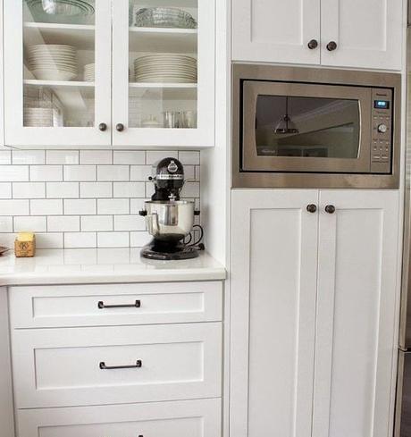 Where there is an existing self-standing green cabinet, a pantry will be built with a cut out for the microwave similar to the once pictured here, but to match our existing cabinetry. As a petite (okay, short) person, I hate that the microwave is currently over the stove. I have burned myself on countless occasions.