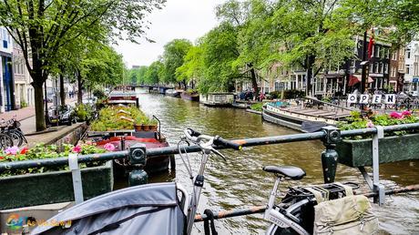 Bicycles and canals are a trademark of Amsterdam