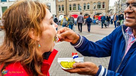 Eating pickled herring in Amsterdam