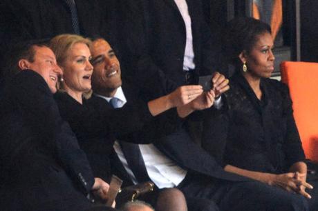 Dignity: Posing for a selfie at a memorial service