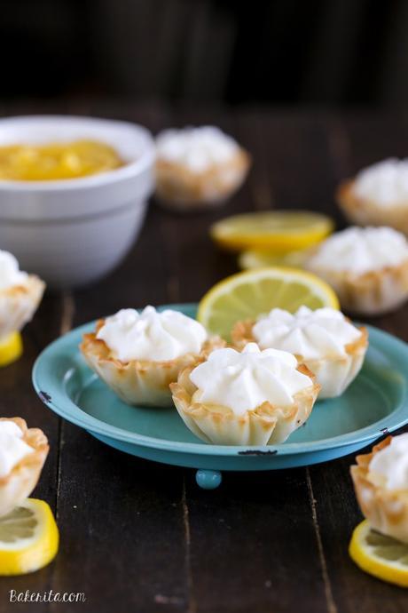 These Lemon Cream Pie Bites may be tiny, but they're bursting with bright lemon flavor. Lemon curd and whipped cream are the stars of these bite-sized pies - no baking required!