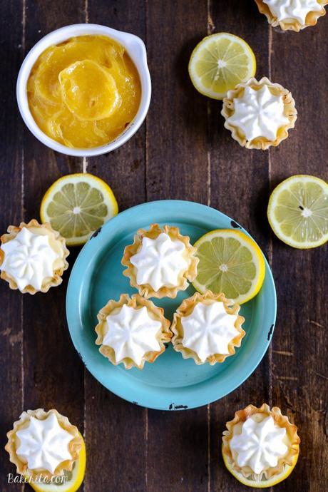 These Lemon Cream Pie Bites may be tiny, but they're bursting with bright lemon flavor. Lemon curd and whipped cream are the stars of these bite-sized pies - no baking required!