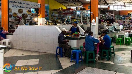 Food stall in Banos mercado, serving local fare