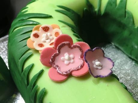 edible glitter purple orange and pink flowers handmade fondant icing