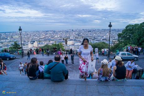 Sunset and the lights of Paris at Sacre Coeur.