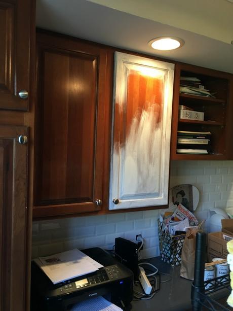 client trying to paint with chalk paint on cabinets