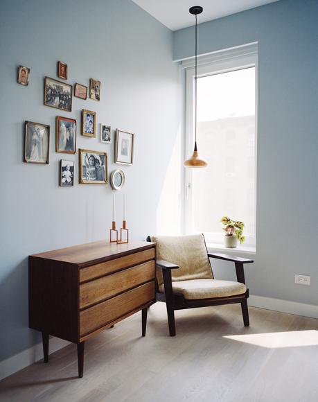 The home office is furnished with a vintage Hans Wegner armchair and a pendant by Jo Hammerborg.