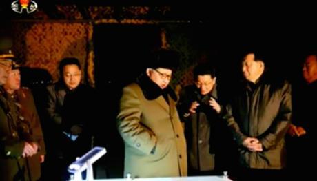 Kim Jong Un is briefed prior to the mobile ballistic missile test (Photo: KCTV screen grab).