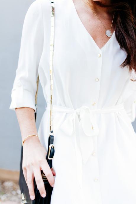 Dallas blogger Amy Havins wears a white Amanda Uprichard shirtdress.