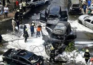 The prosecutor general’s convoy after a bomb on a Cairo Street