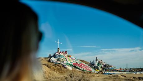 Salvation Mountain in California, my sister at the wheel.