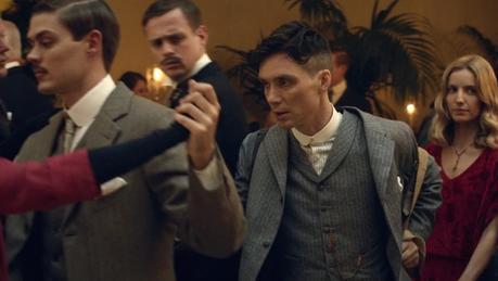 Peaky Blinders – Tommy’s Gray Striped Flannel Suit Pro tip: Your date won't like it if you ditch her in the middle of a song to deliver a sack of stolen money to a gangster.