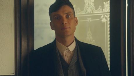 Peaky Blinders – Tommy’s Gray Striped Flannel Suit Tommy briefly watches Grace singing in the fifth episode.