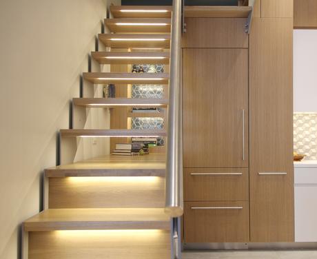 A Manhattan apartment with an airy staircase. 