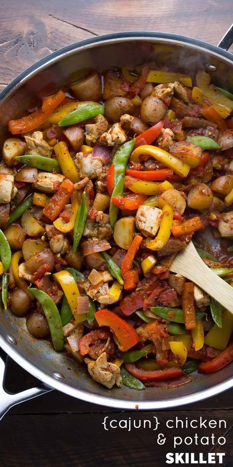 Chicken thighs are cooked with cajun-spiced potatoes, bell peppers and peas in this one pot, 30-minute dinner recipe!