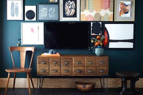 Living Room With Dark Blue Walls And Library Card Catalog As A Media Unit Plus Gallery Wall
