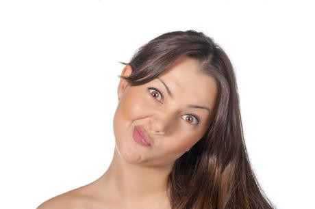 brunette girl making funny face