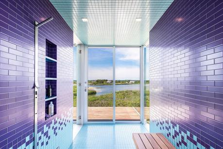 A brightly tiled bathroom in a waterfront home in New York
